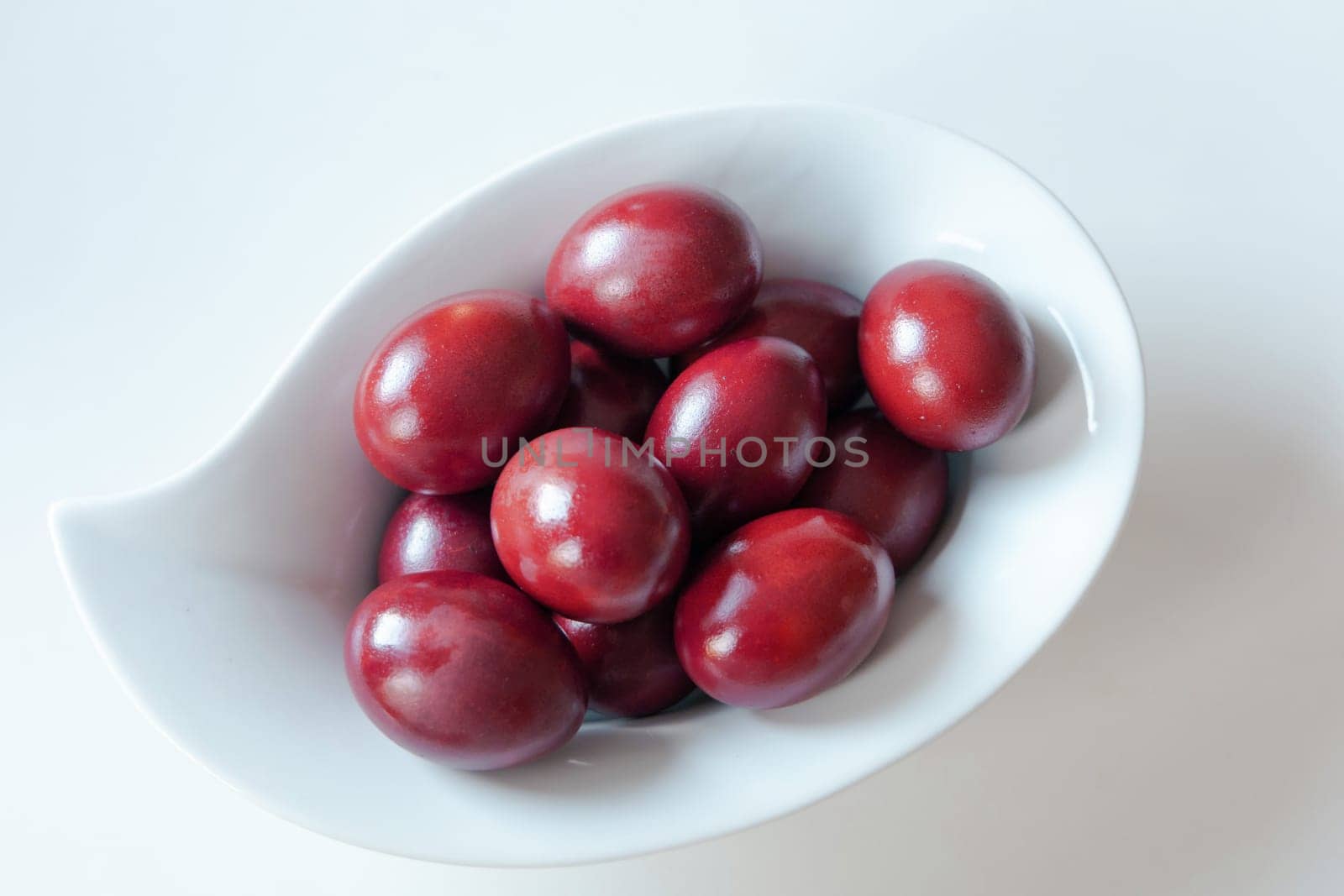 Traditional red easter eggs. Chicken eggs are painted red. High quality photo