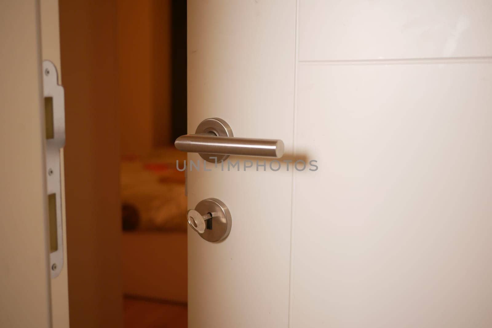 open door concept with Door handle and blur interior room background,