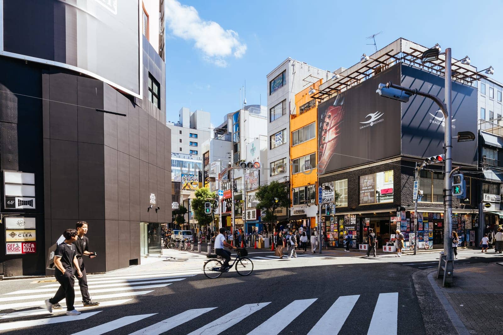 OSAKA, JAPAN - SEPTEMBER 26 2024: The trendy and fashionable Amerikamura district on a clear autumn day in Osaka, Japan