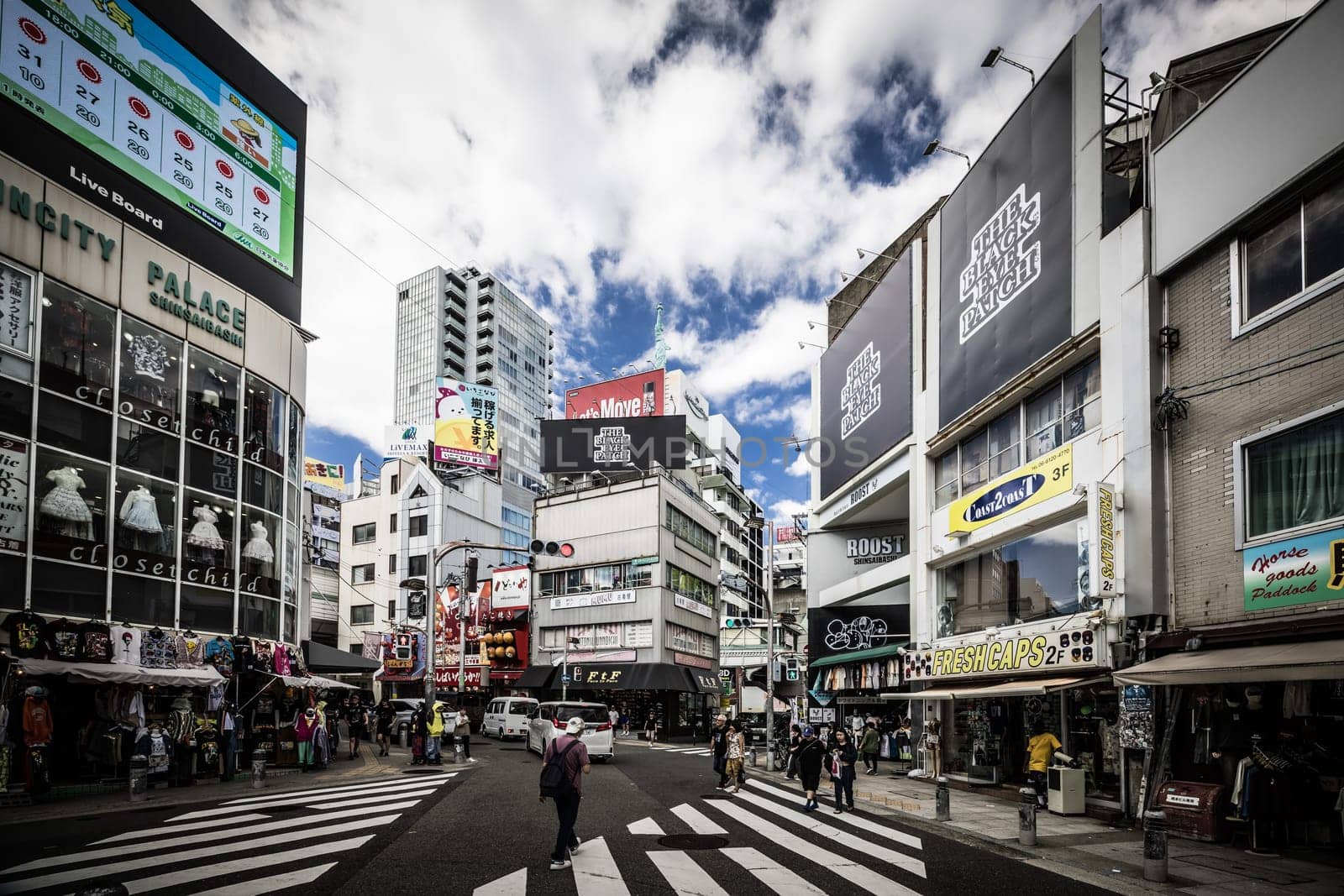 OSAKA, JAPAN - SEPTEMBER 26 2024: The trendy and fashionable Amerikamura district on a clear autumn day in Osaka, Japan
