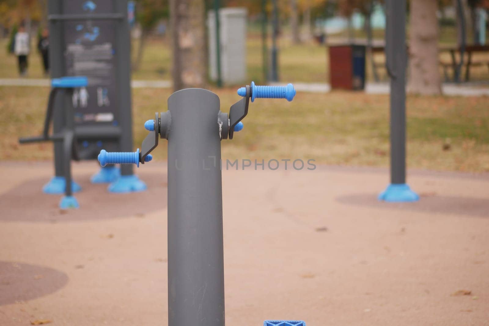 A modern exercise station designed for conducting outdoor workouts conveniently located in a park