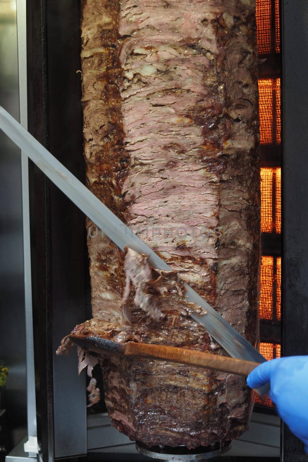 Close-Up of Juicy Shawarma Meat Being Sliced,