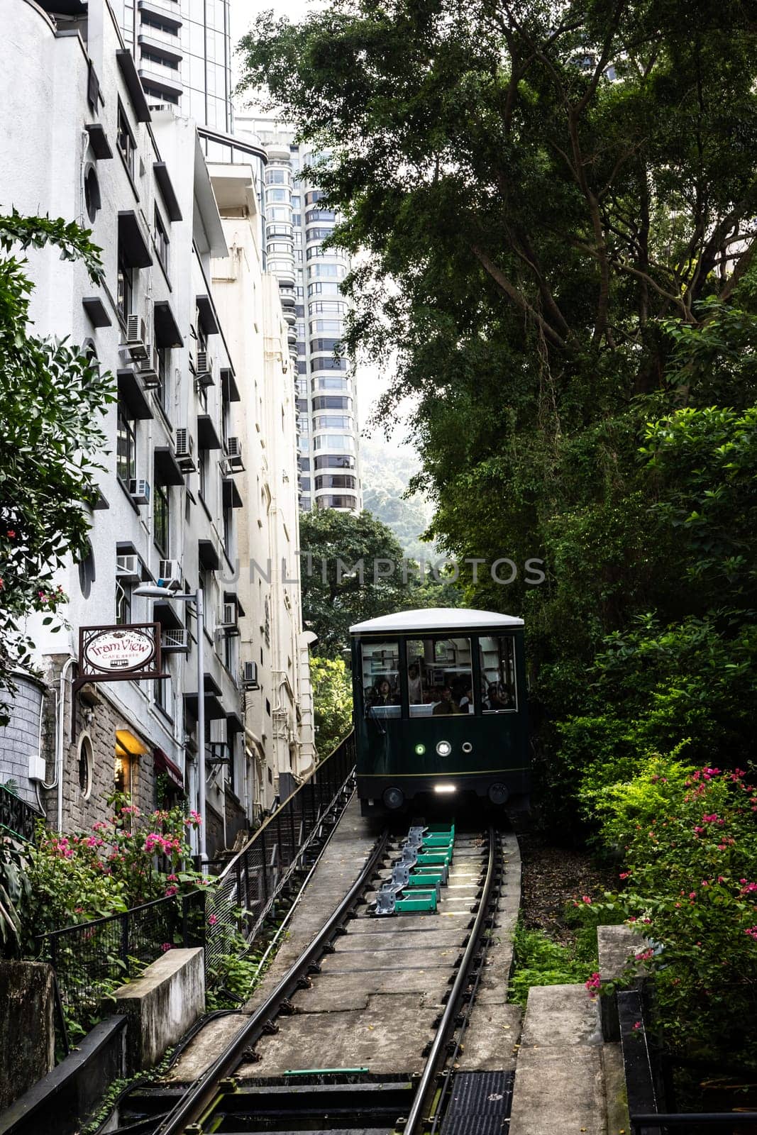 HONG KONG, CHINA - SEPTEMBER 29, 2024: The famous and popular Peak Tram as it ascends Victoria Peak in Hong Kong, China