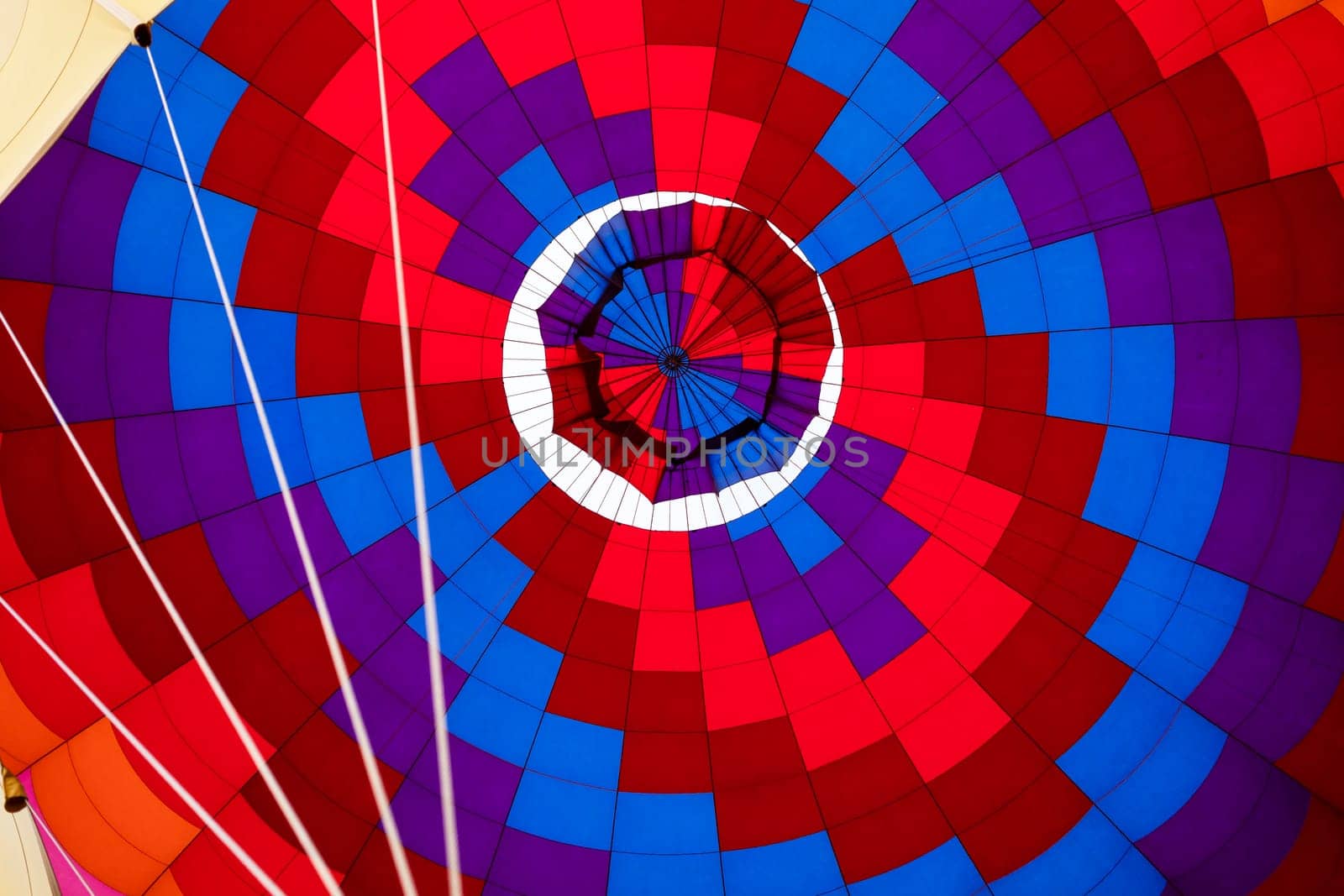 Abstract Background, View Inside Bright Colorful Hot Air Balloon Dome. Multi Colored, Horizontal Plane. Hot Air Expedition, Ride. Joyful, Spectacular Entertainment. High quality photo
