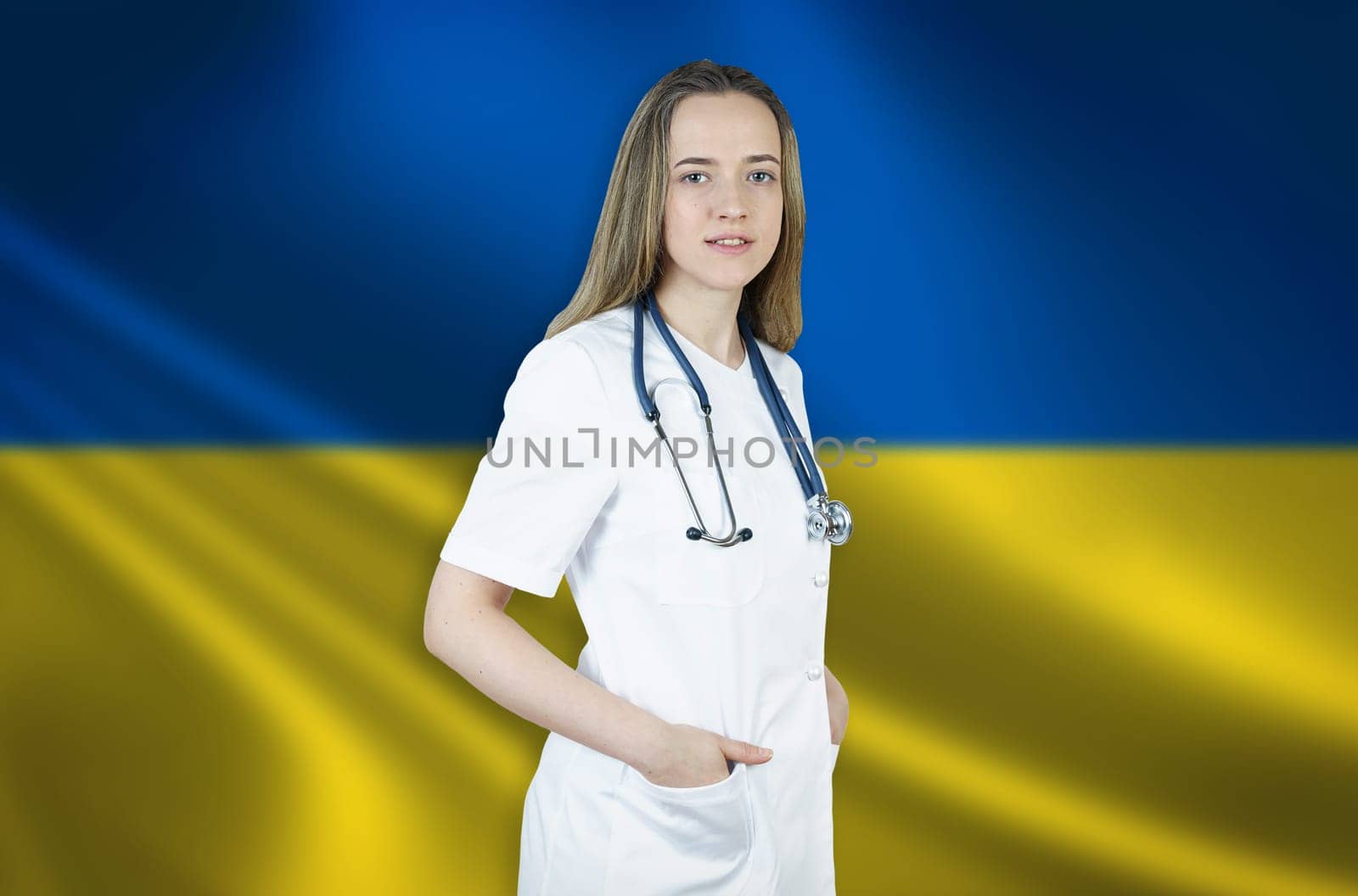 A young female doctor in a white coat and a stethoscope stands on the background of the flag of Ukraine by Sd28DimoN_1976