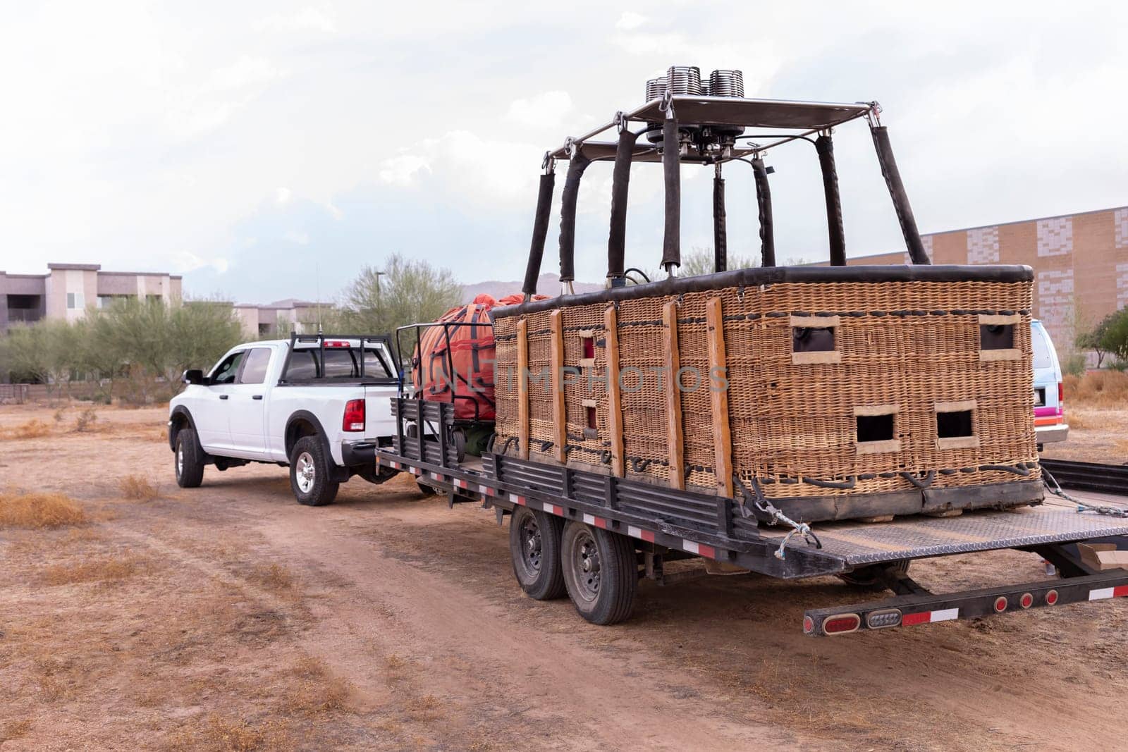 Car, Truck Ride With Hot Air Balloon Basket On Car Trailer, Preparing To Fire Up Balloon In The Field. Equipment Baskets, Propeller, Gas Burner And Canopy Package. Horizontal Plane. High quality photo