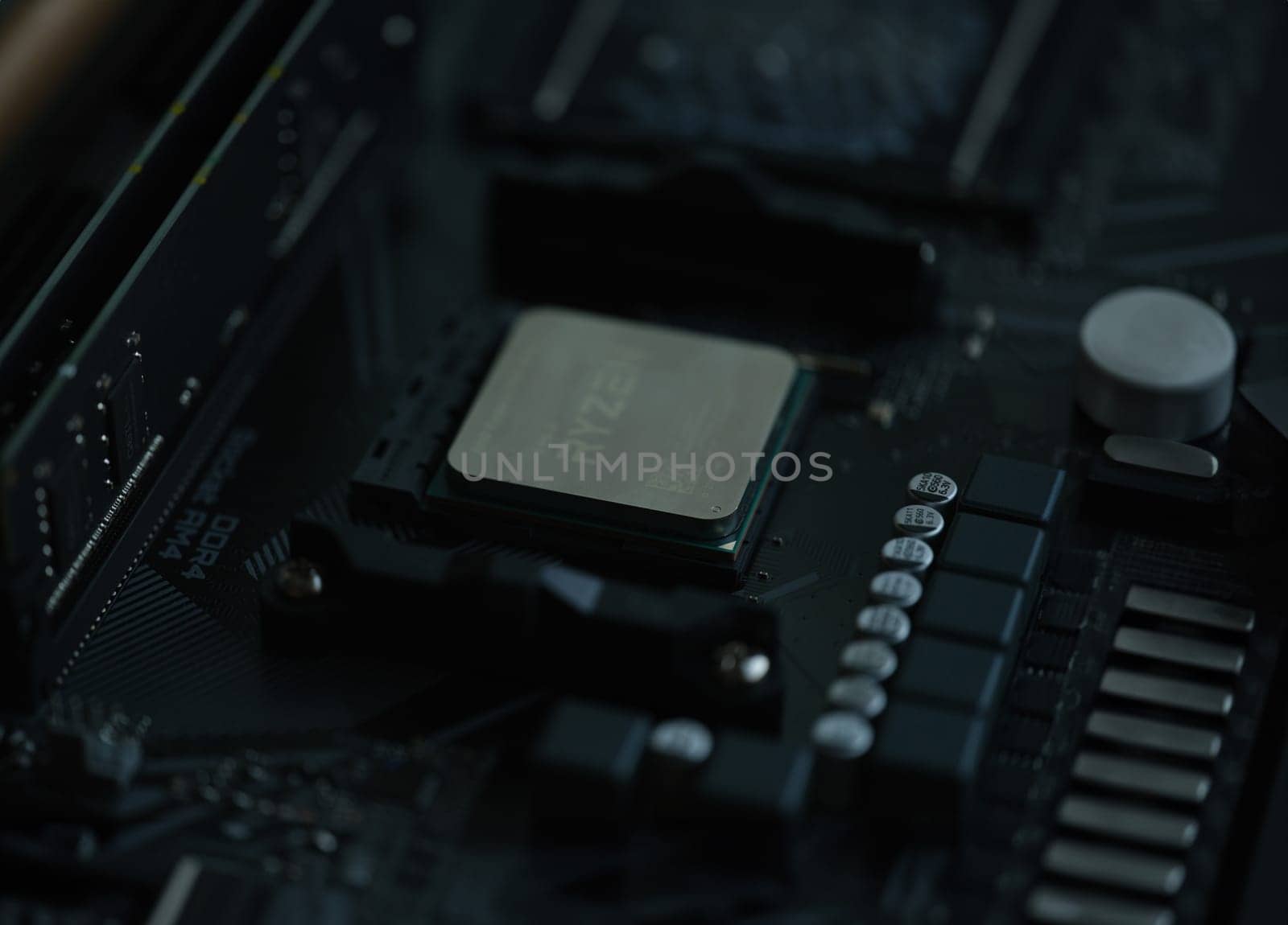 Tbilisi, Georgia - July 26, 2022: Closeup of AMD Ryzen processor motherboard. High performance microprocessor introduced by AMD