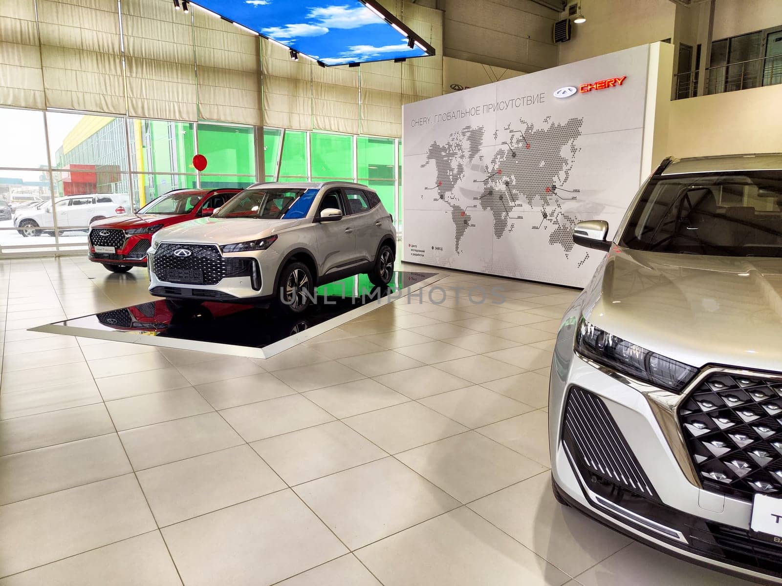 Tumen, Russia - November 09, 2024: Beautiful car in showroom of dealership Chery