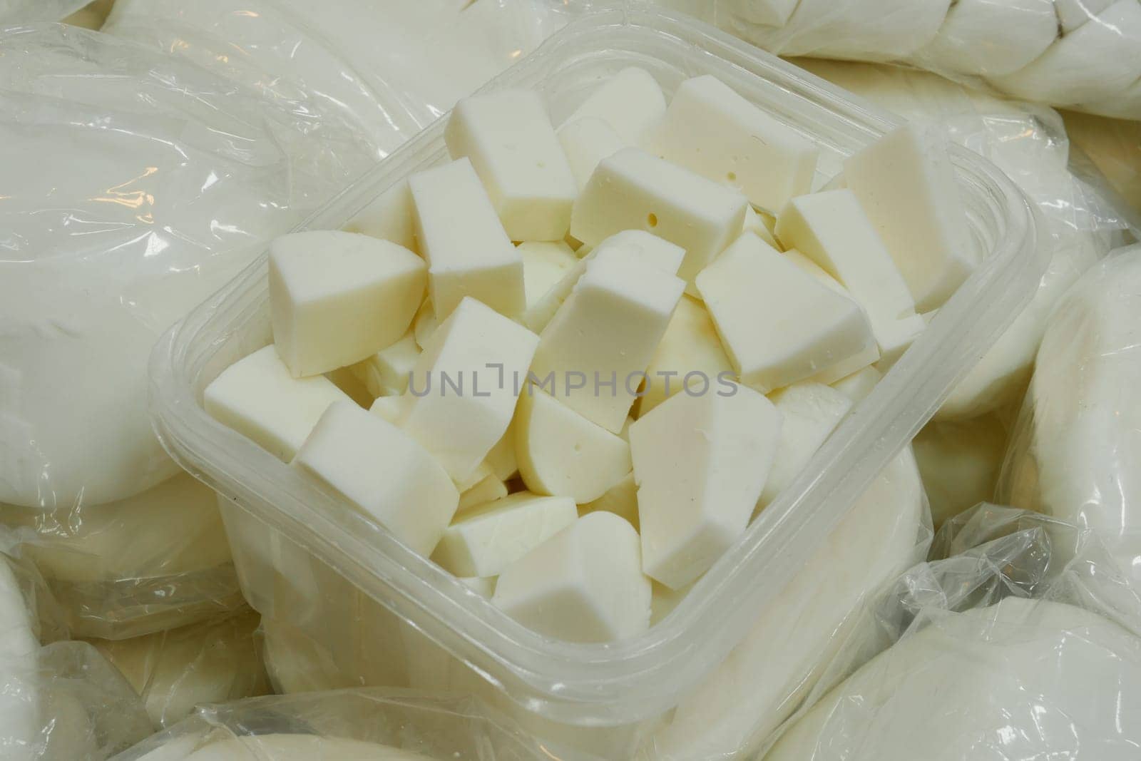 An appealing assortment of fresh white cheddar cheese cubes beautifully displayed for all to see