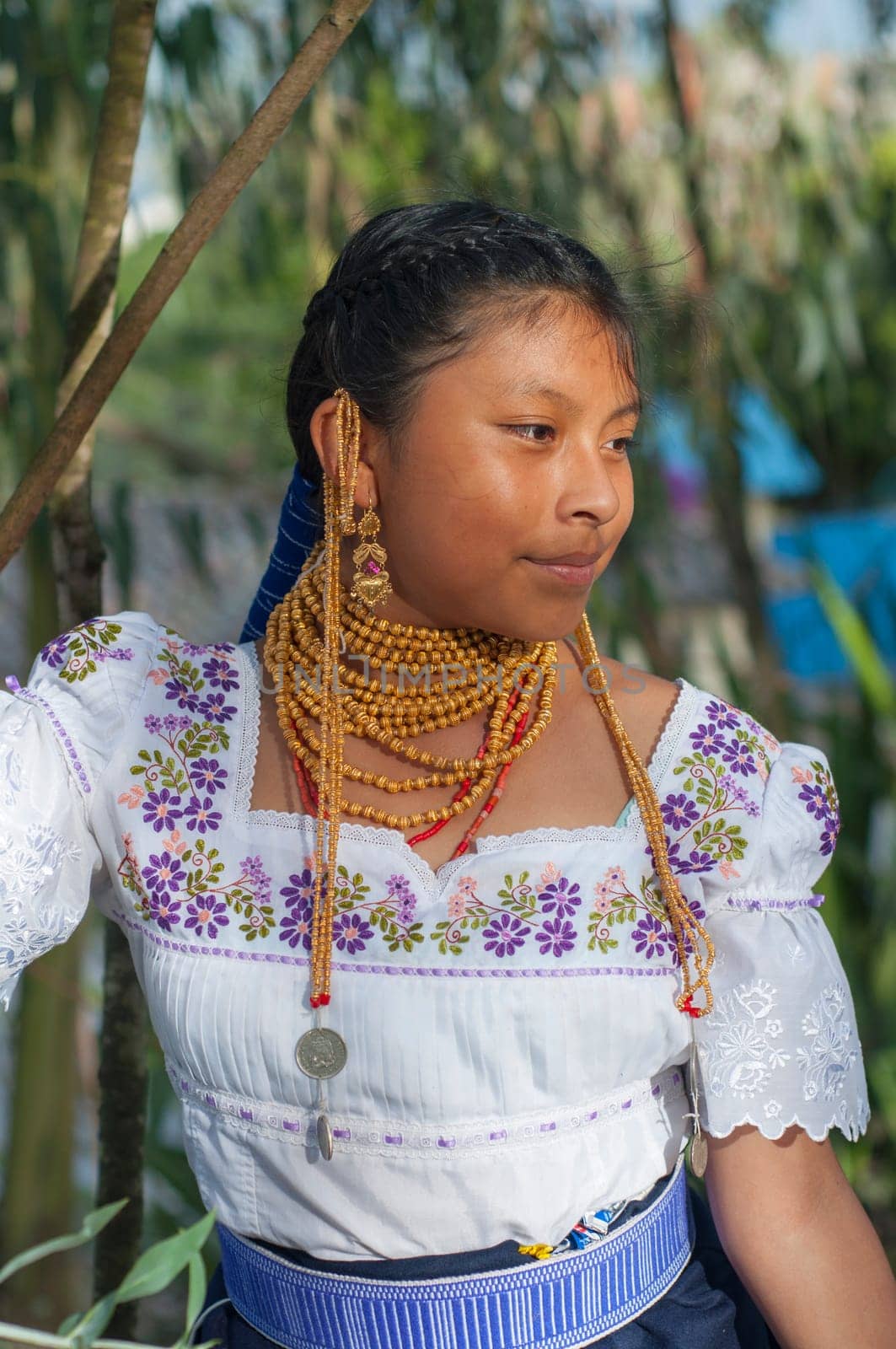 Indigenous Beauty in a Tranquil Natural Setting: Young Person's Serene Pose by Raulmartin