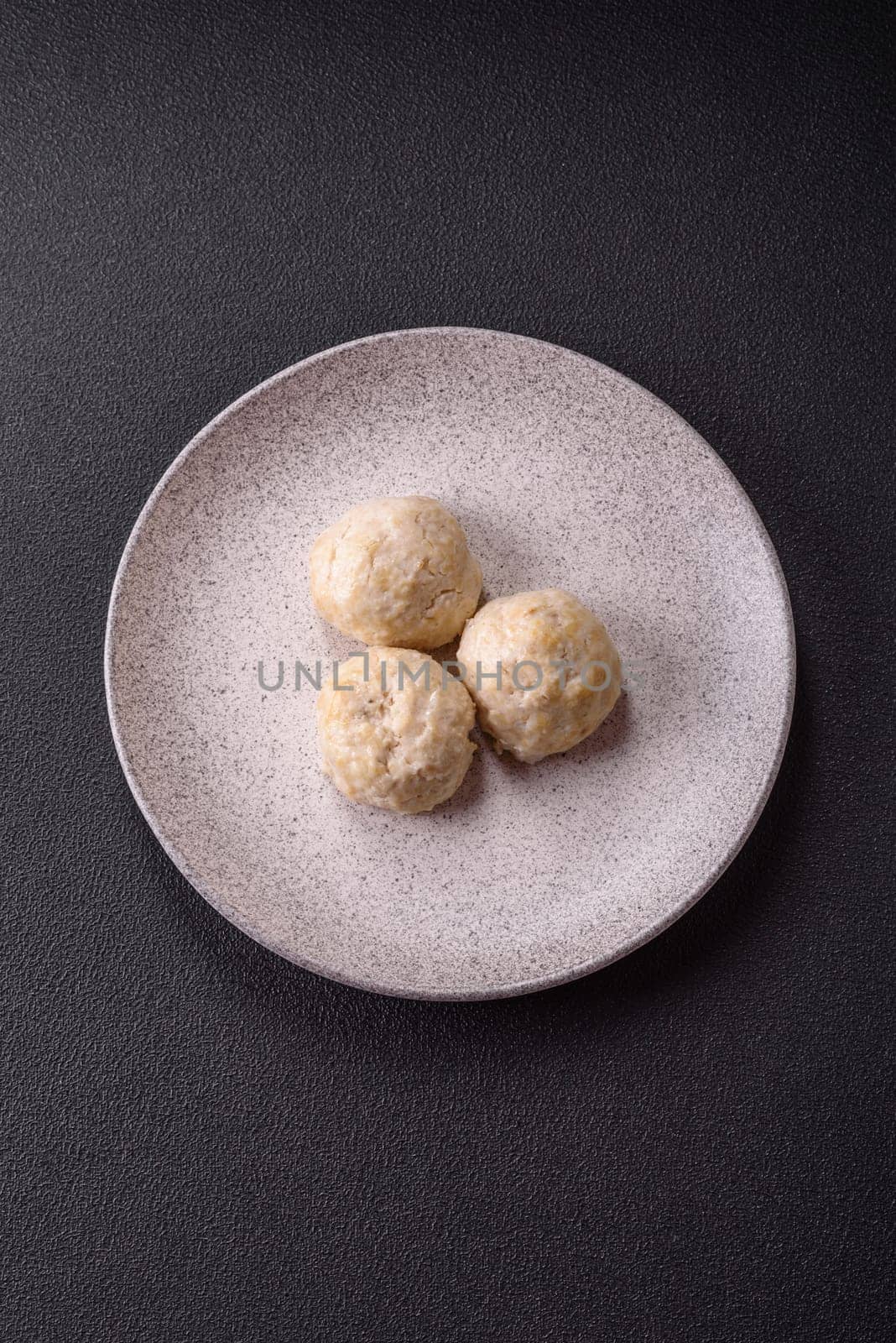 Delicious healthy steamed chicken cutlets or minced meatballs. Diet food dish
