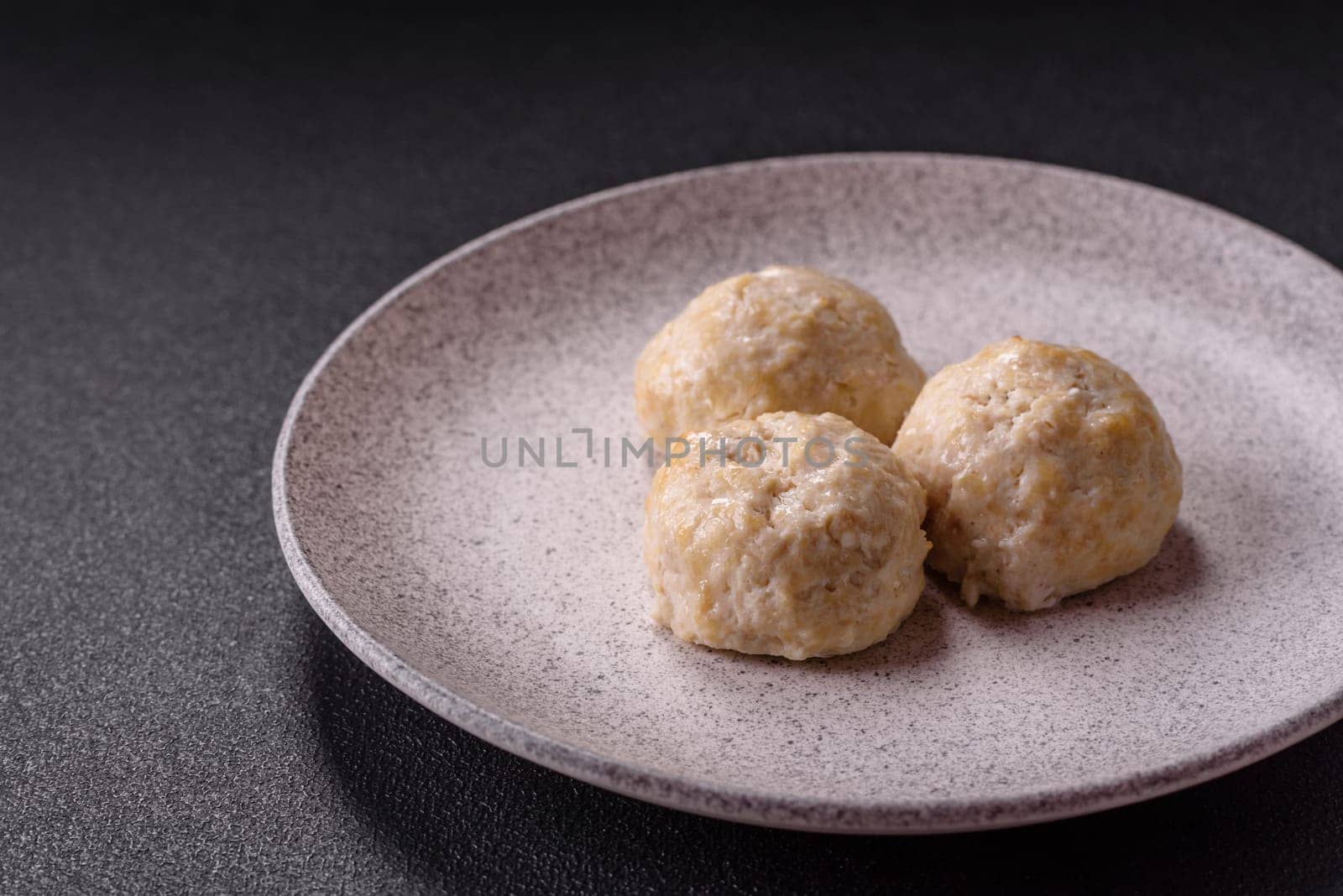 Delicious healthy steamed chicken cutlets or minced meatballs. Diet food dish