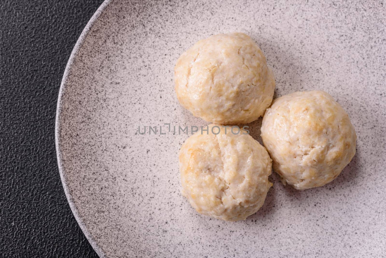 Delicious healthy steamed chicken cutlets or minced meatballs. Diet food dish