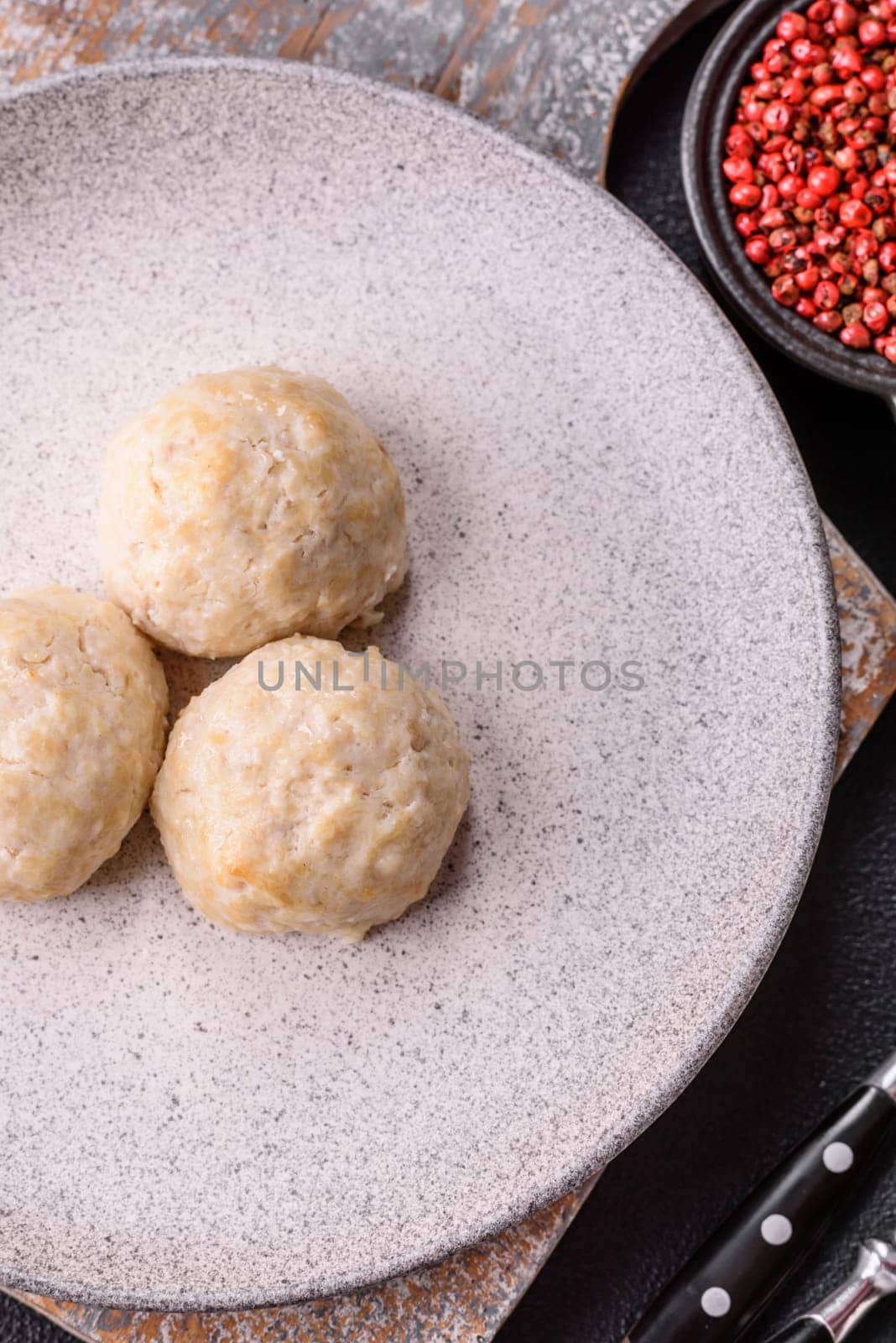 Delicious healthy steamed chicken cutlets or minced meatballs. Diet food dish