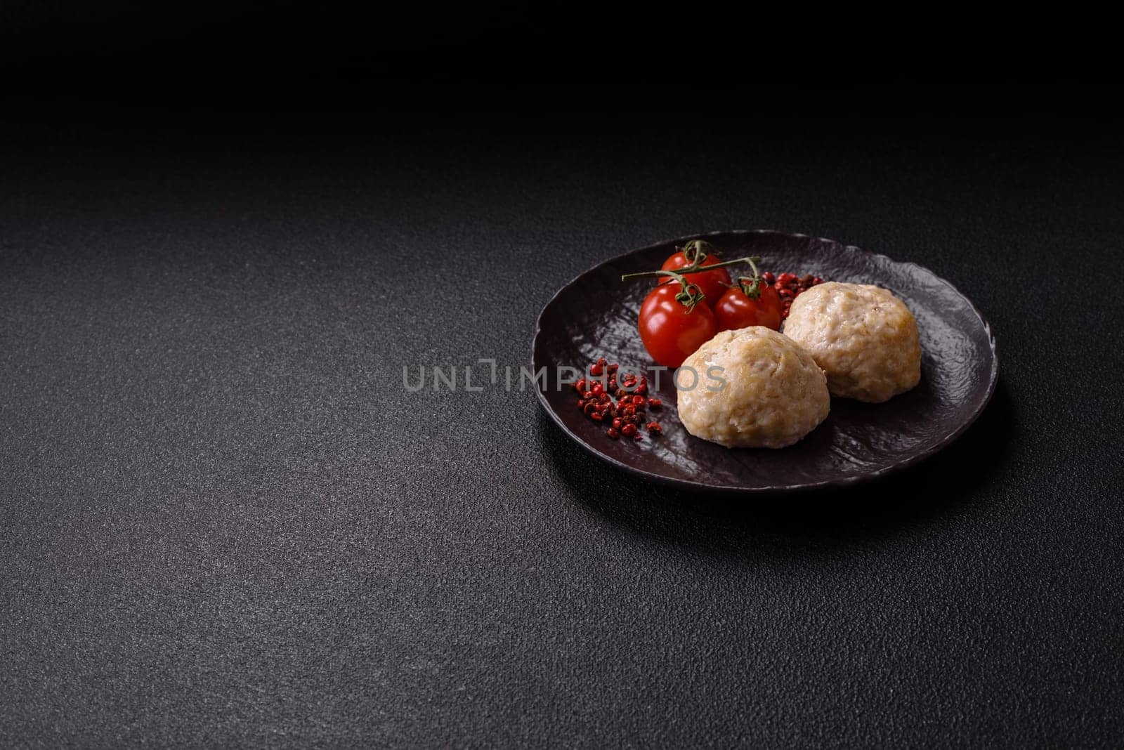 Delicious healthy steamed chicken cutlets or minced meatballs. Diet food dish