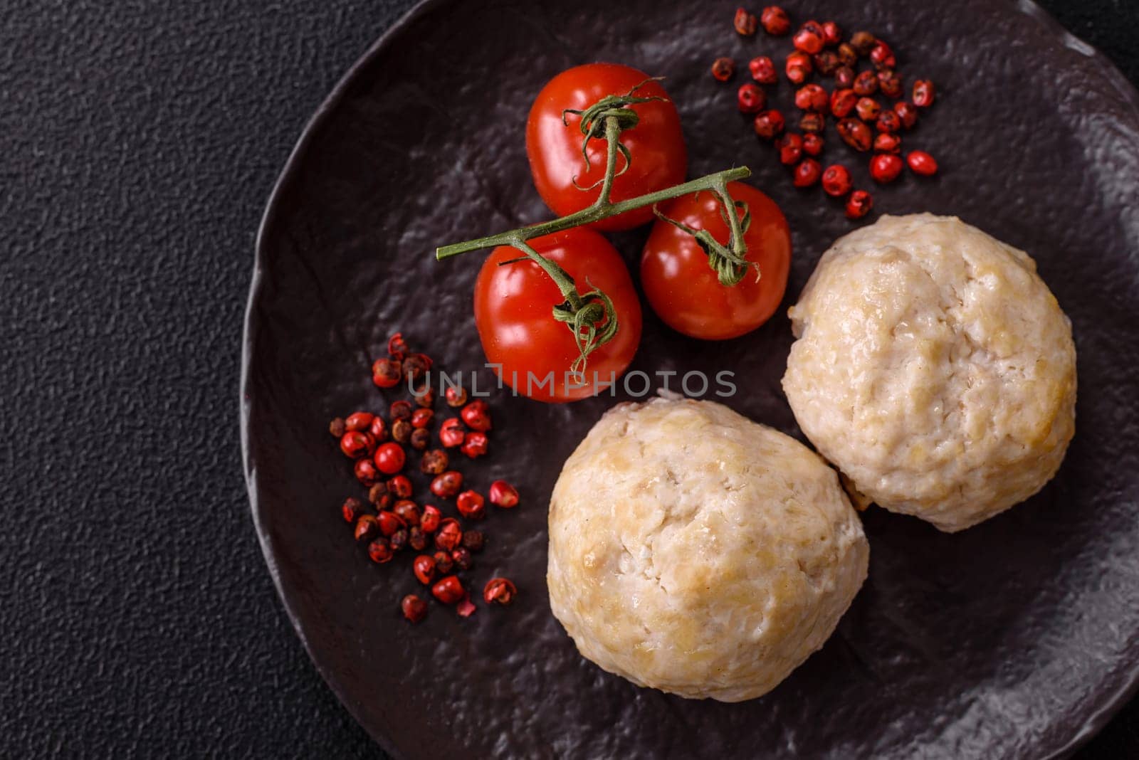 Delicious healthy steamed chicken cutlets or minced meatballs. Diet food dish