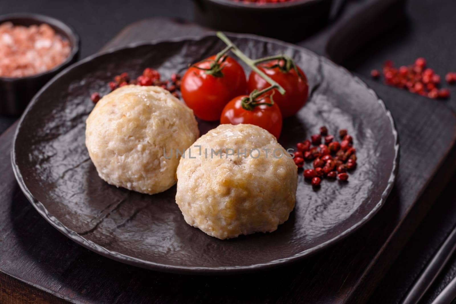 Delicious healthy steamed chicken cutlets or minced meatballs. Diet food dish