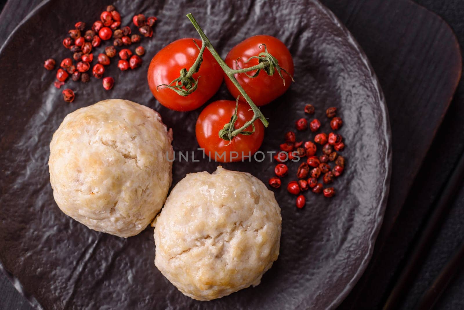 Delicious healthy steamed chicken cutlets or minced meatballs. Diet food dish