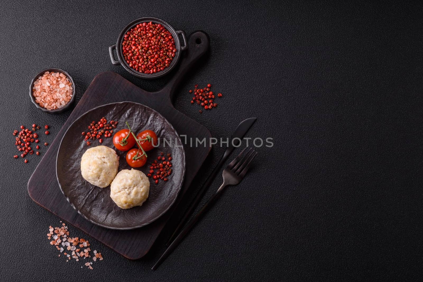 Delicious healthy steamed chicken cutlets or minced meatballs. Diet food dish