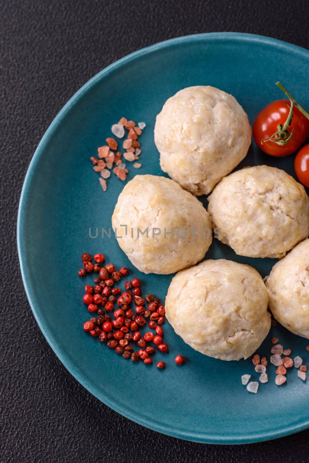 Delicious healthy steamed chicken cutlets or minced meatballs. Diet food dish
