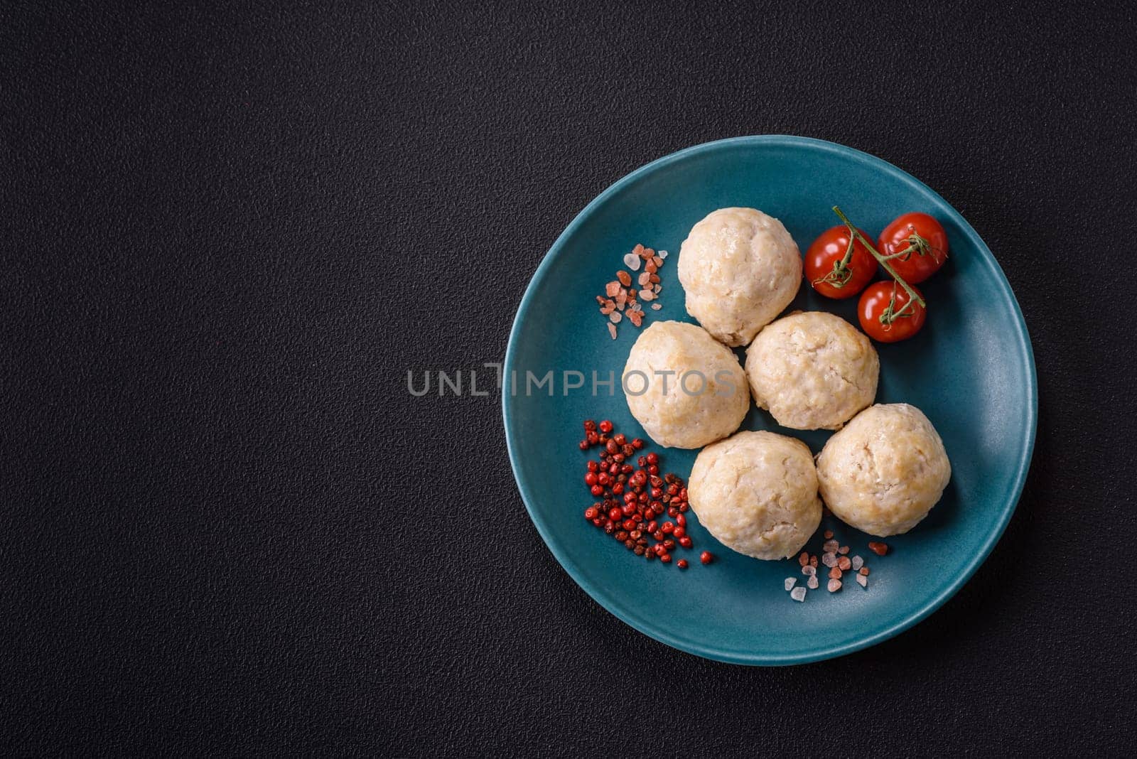Delicious healthy steamed chicken cutlets or minced meatballs. Diet food dish