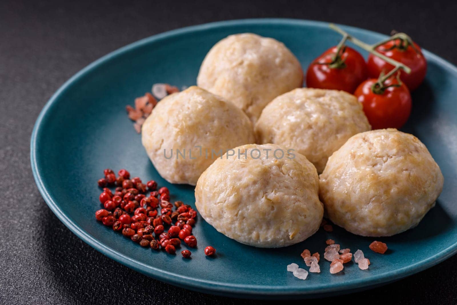 Delicious healthy steamed chicken cutlets or minced meatballs. Diet food dish