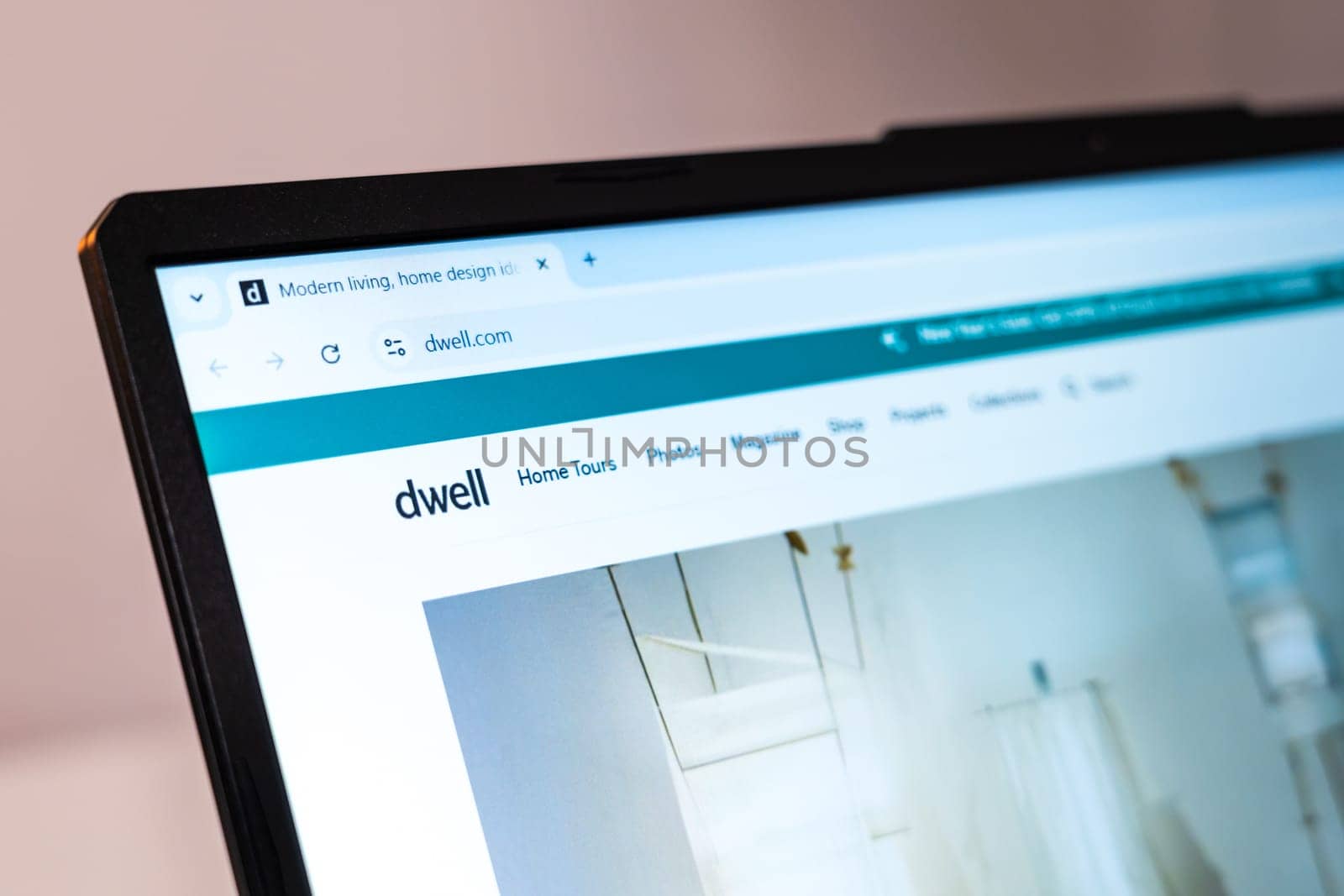New York, USA - January 01, 2025: Website of Dwell Magazine displayed on a laptop screen, showcasing modern home design, interior decor ideas, architecture trends, and contemporary lifestyle inspirations