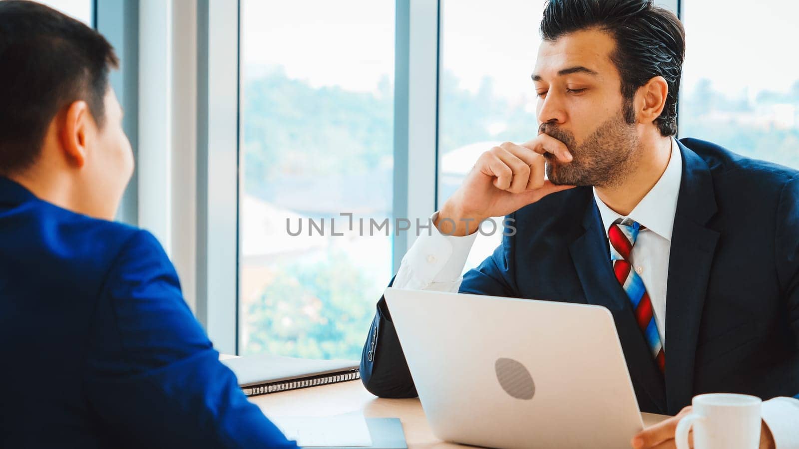 Job seeker in job interview meeting with manager and interviewer at corporate office. The young interviewee seek for professional career job opportunity . Human resources and recruitment concept. Jivy