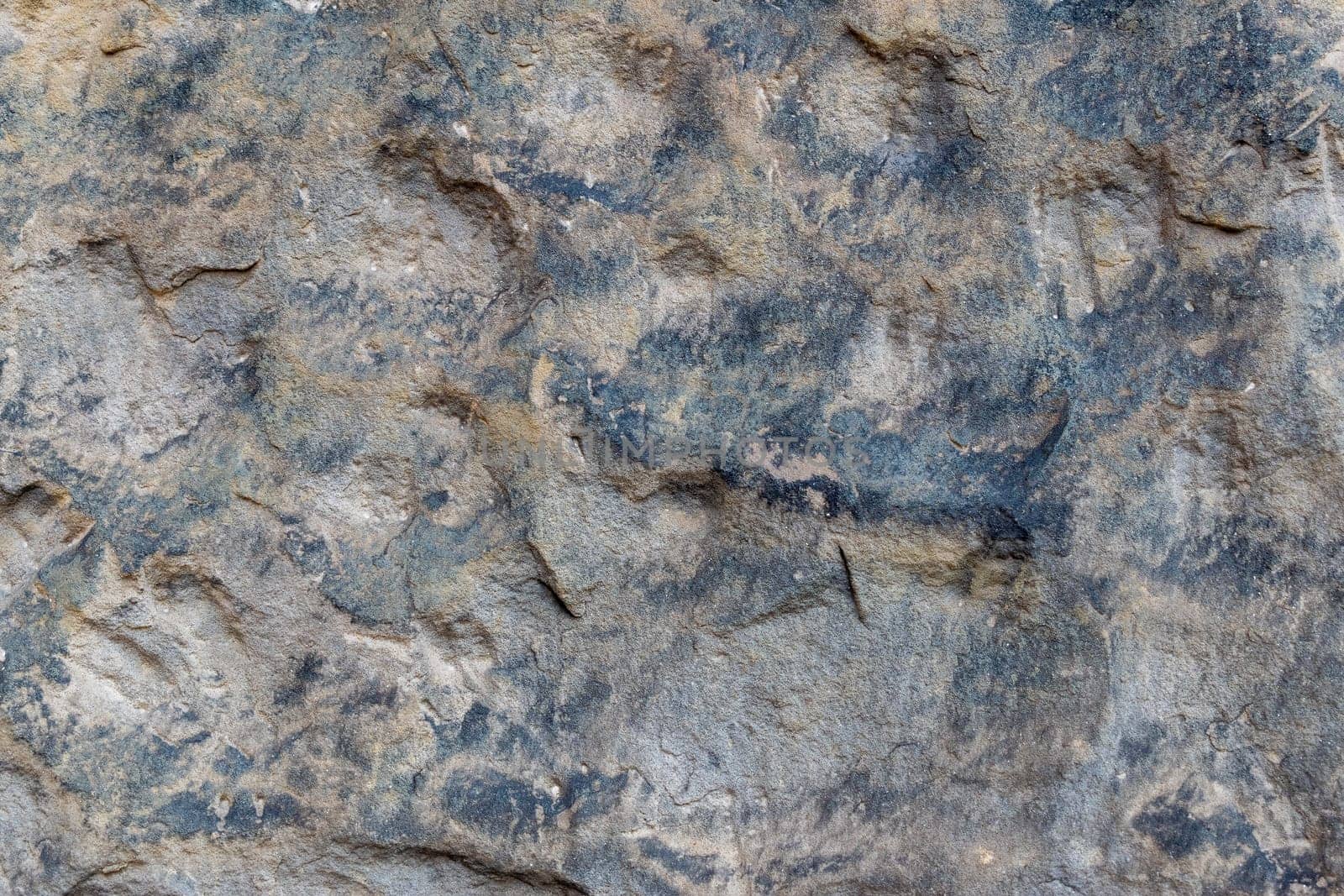 Detail of stone worked by years of exposure to water, Background or texture for further graphic work