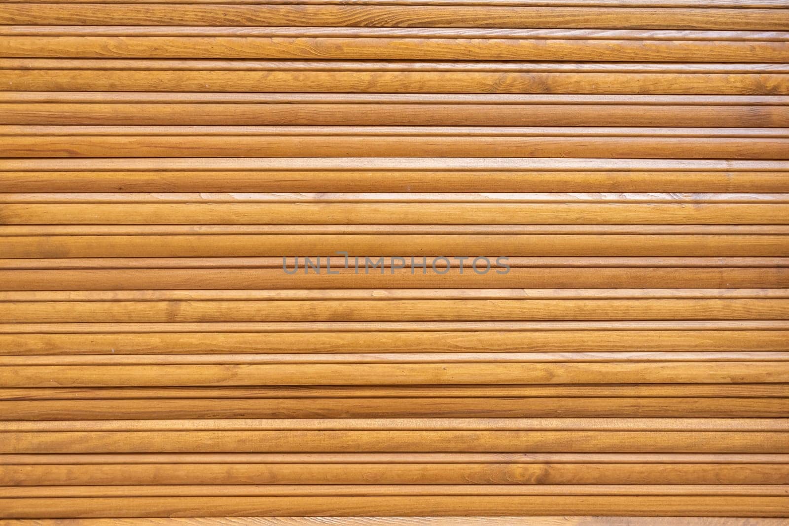 The surface is made of well-preserved light wooden slats. Background or texture for further graphic work