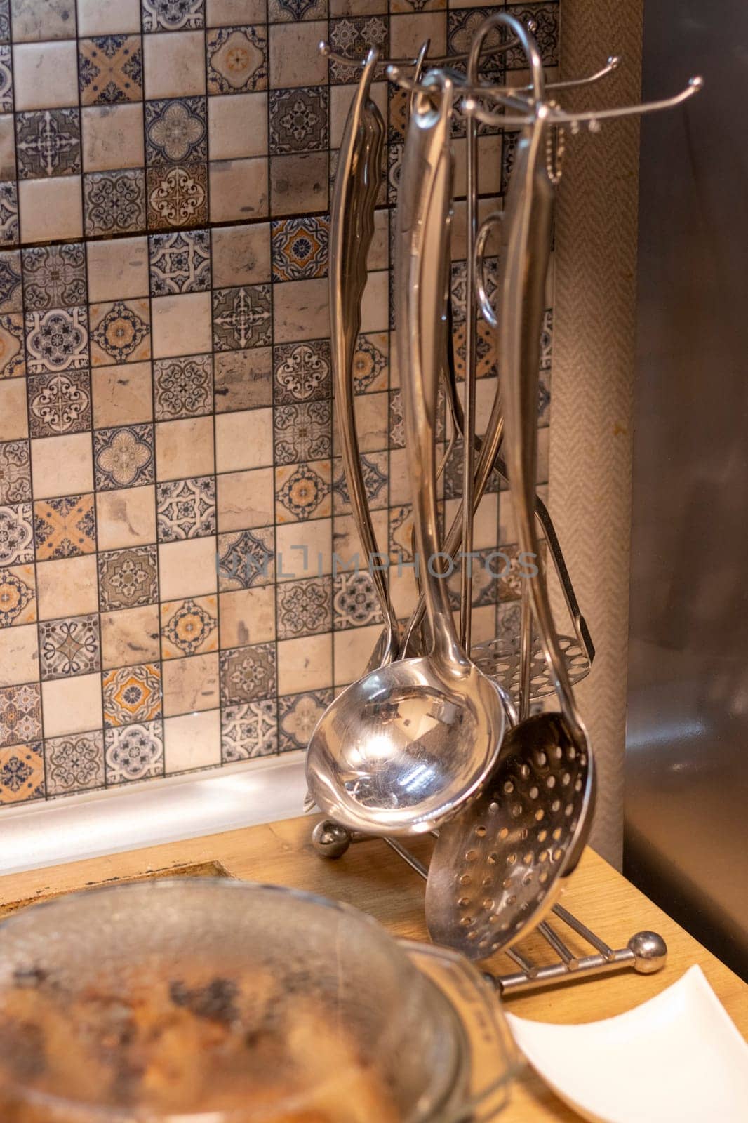 Close up shot of the metal kitchen utensils set