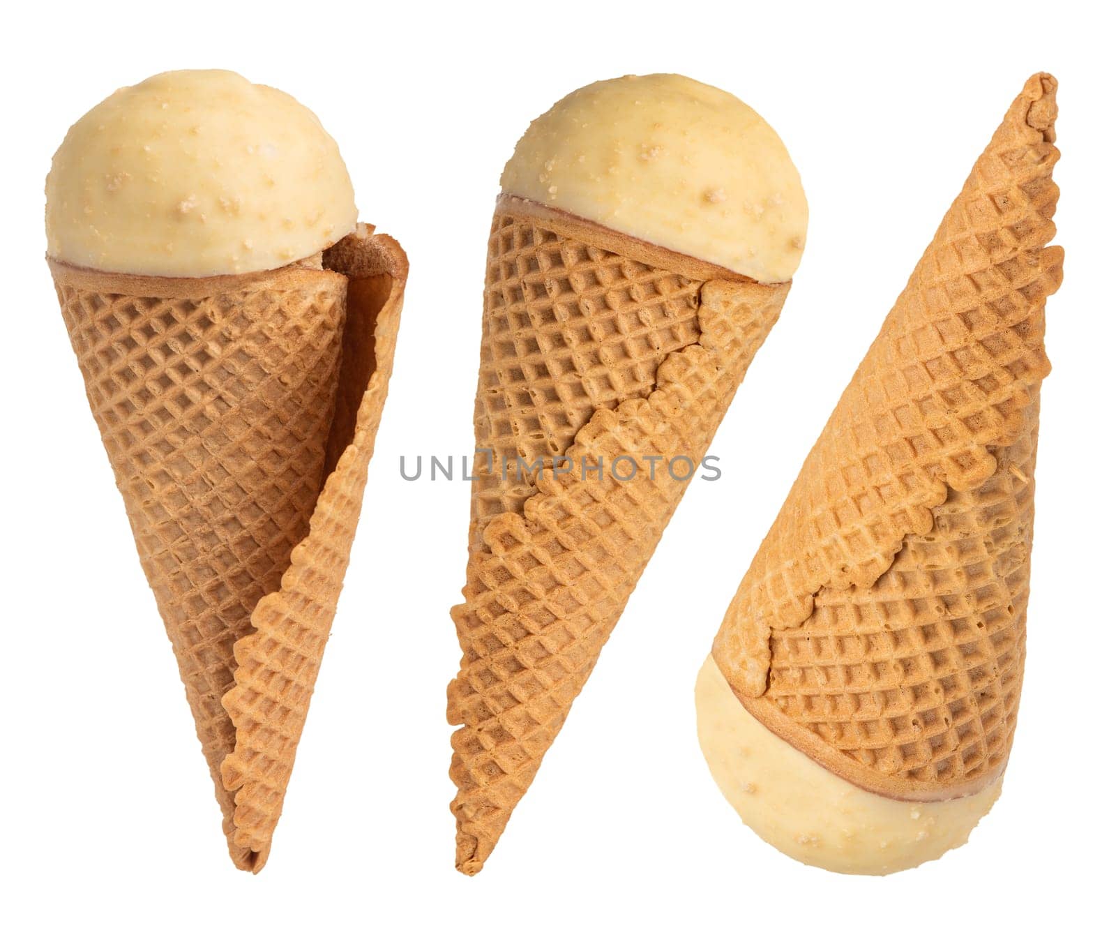 Two ice creams in a vanilla waffle cup on a white isolated background. Vanilla flavor ice cream from different sides on white. High quality photo