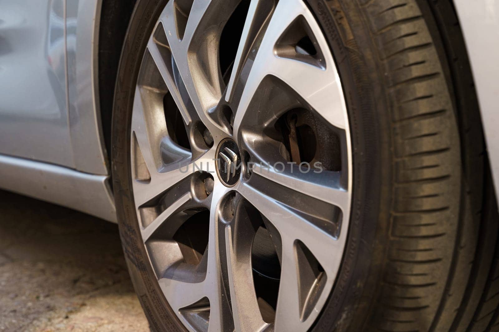 Poznan, Poland - June 20, 2023: The Citroen company logo is on the rim of a car wheel.
