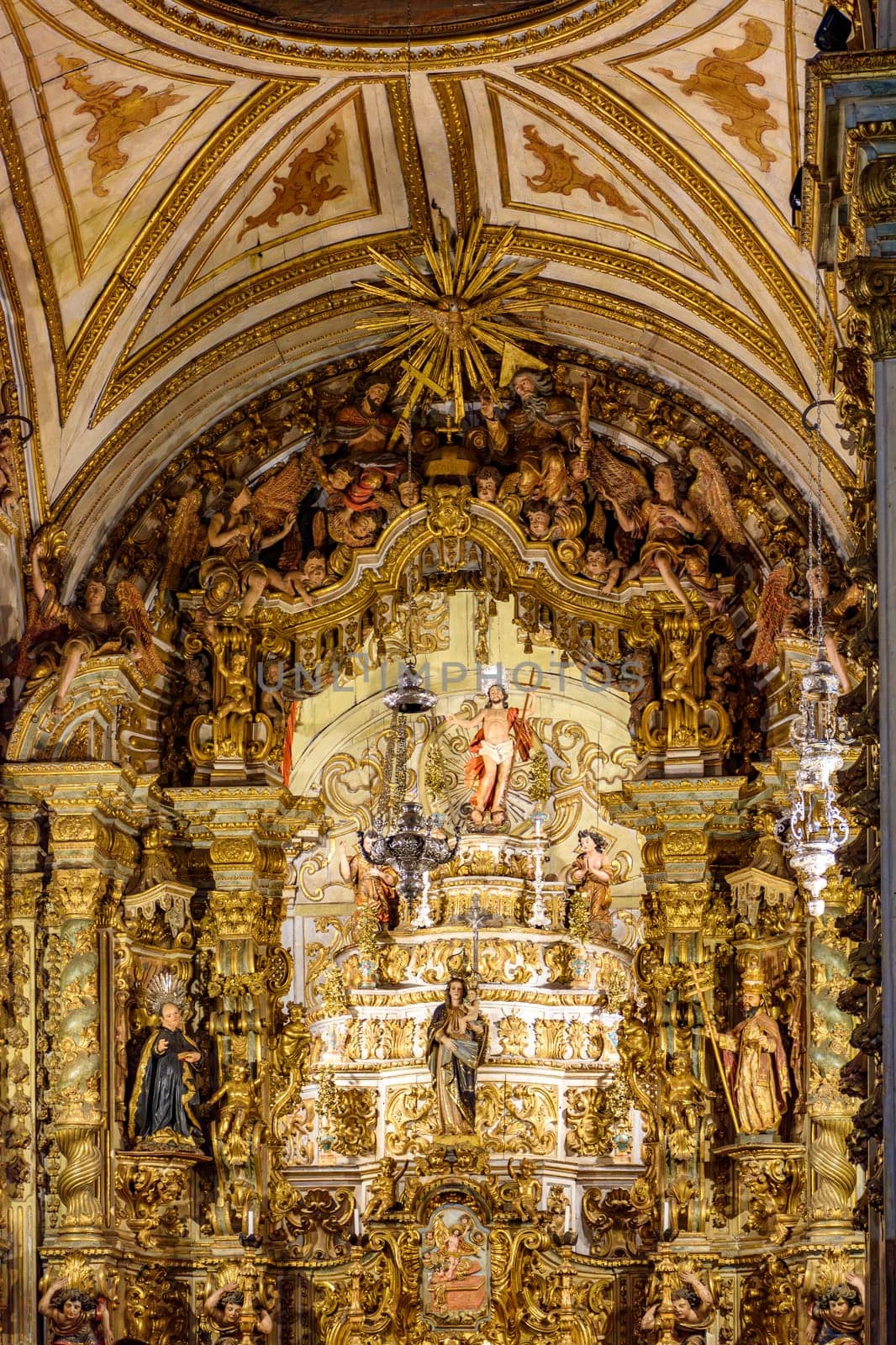Old altar of a historic baroque church completely covered in gold in Ouro Preto, Minas Gerais