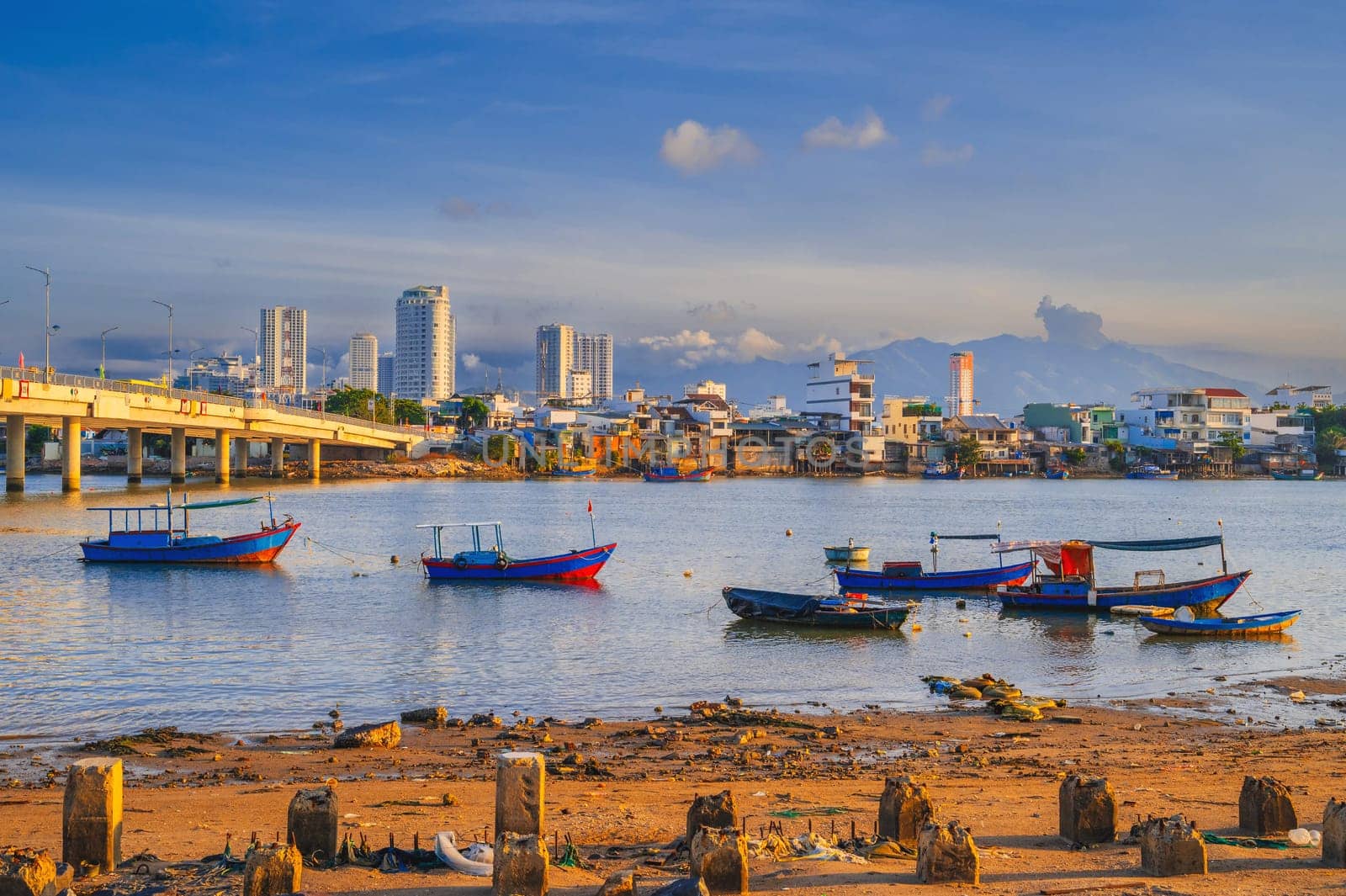 Vietnamese fishing boats at the pier or pier in Nha Trang, Asia.