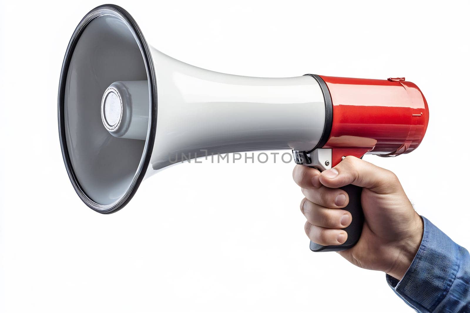 A person holds a red and white handheld megaphone, ready to communicate loudly in a public area, emphasizing clarity.