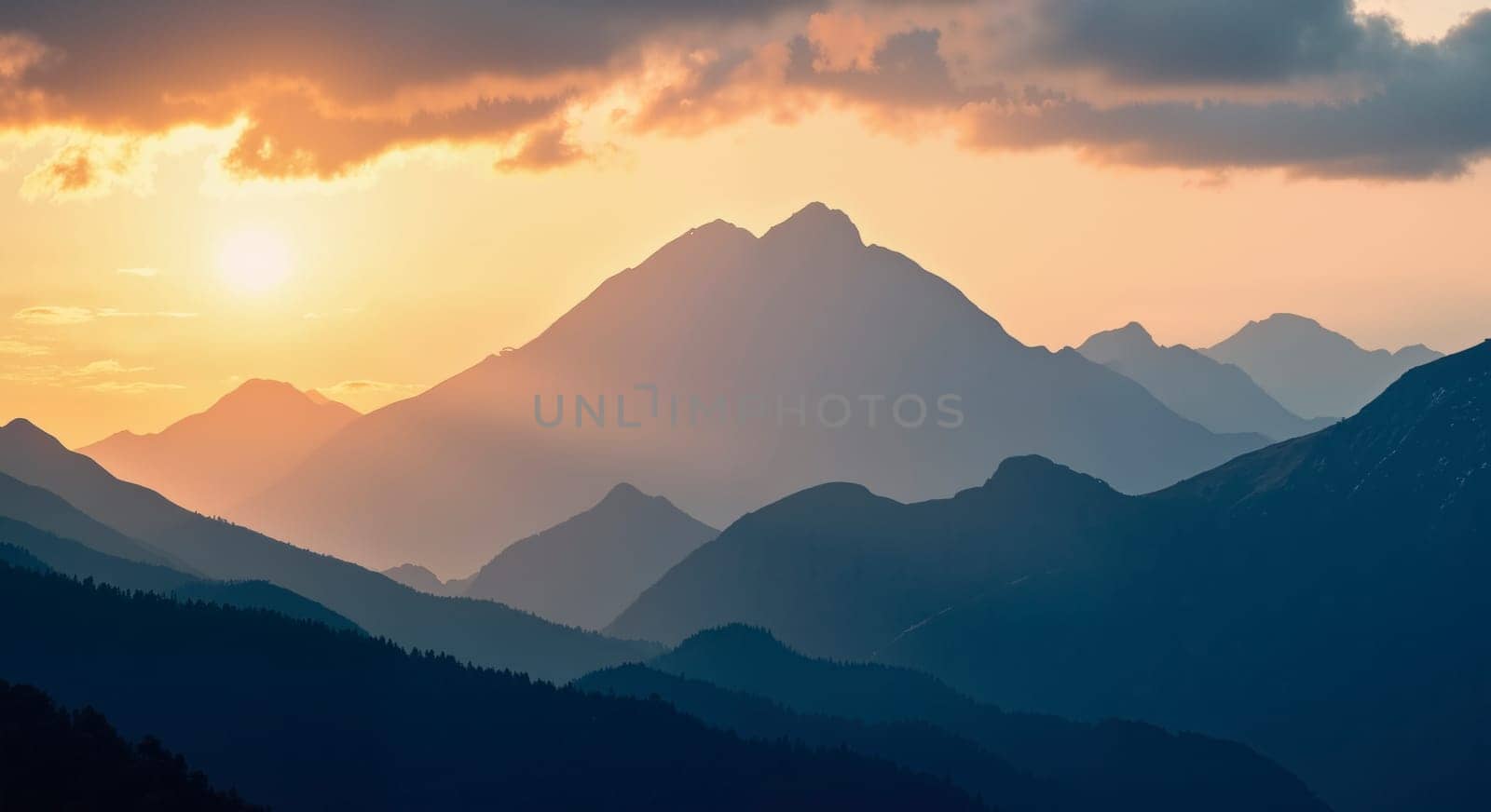 The mountains are covered in a blue sky with a sun setting in the background. The mountains are very tall and the sun is setting behind them