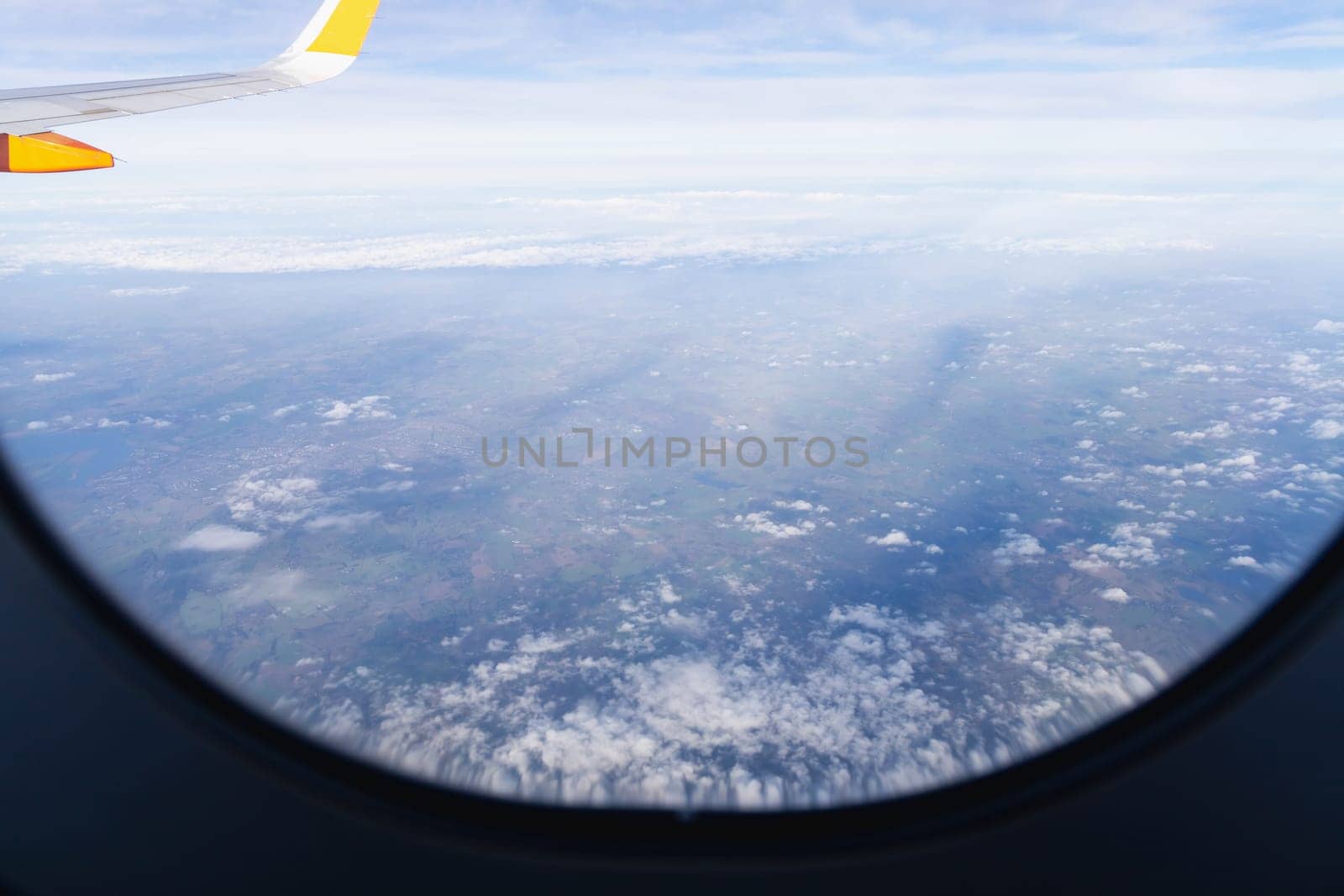 View from airplane window to earth's surface. High quality photo