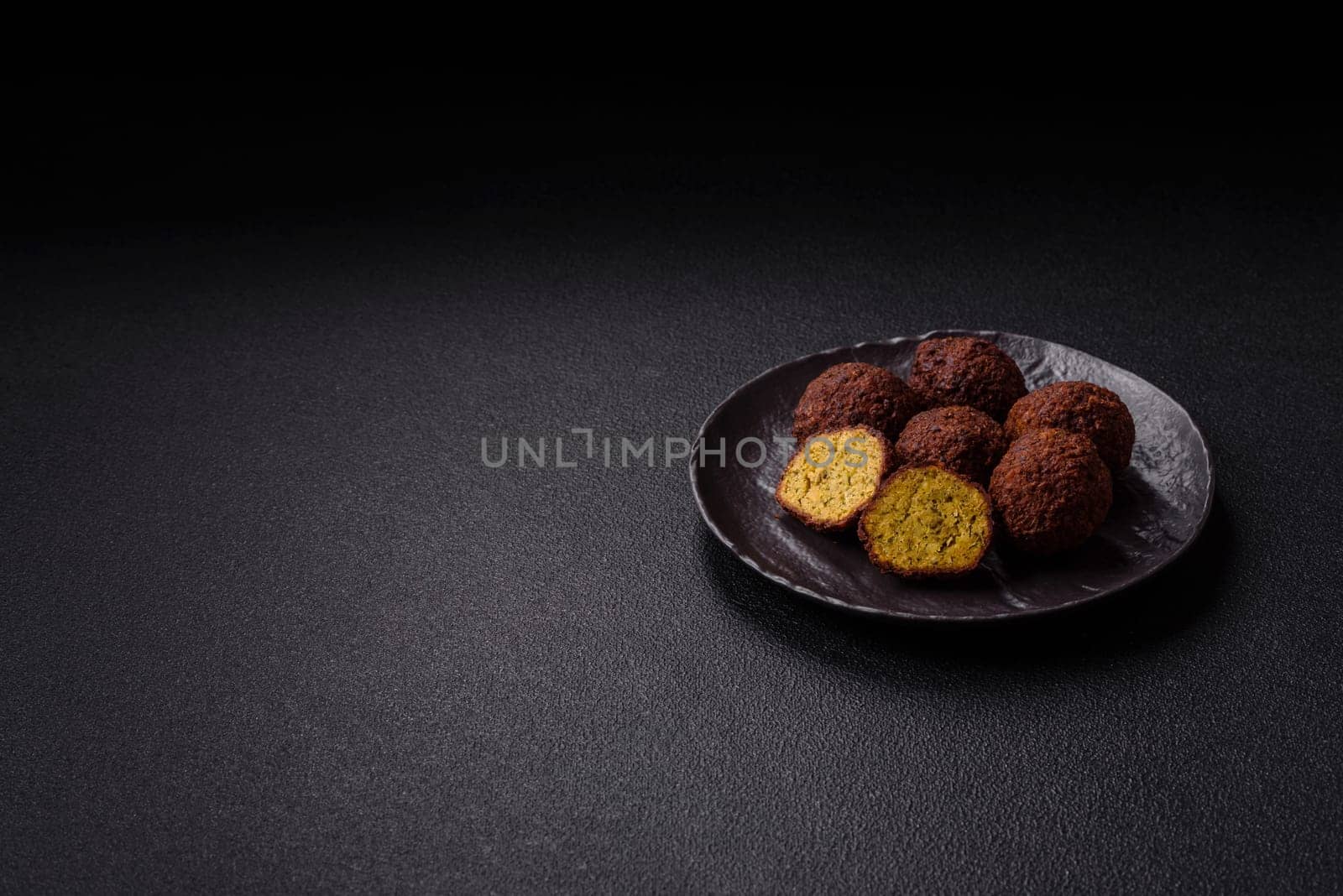 Fried chickpea falafel balls with salt, spices and herbs. Vegetarian and vegan dish