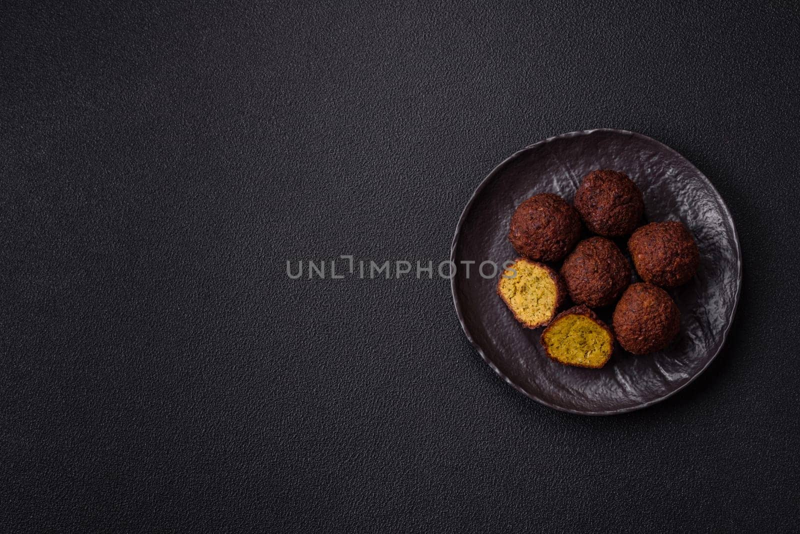 Fried chickpea falafel balls with salt, spices and herbs. Vegetarian and vegan dish