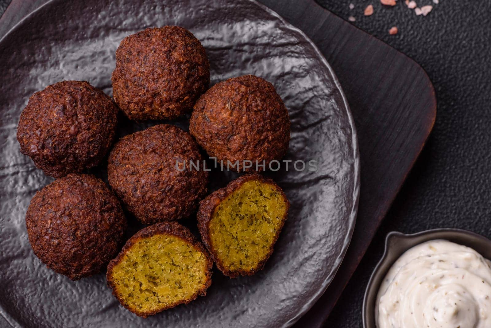 Fried chickpea falafel balls with salt, spices and herbs. Vegetarian and vegan dish