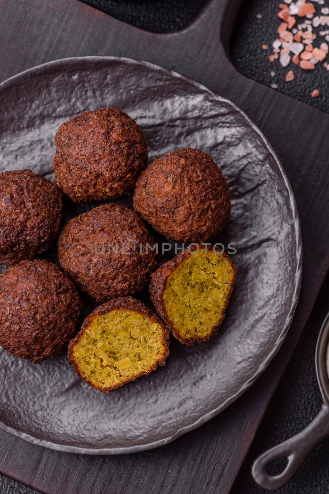 Fried chickpea falafel balls with salt, spices and herbs. Vegetarian and vegan dish