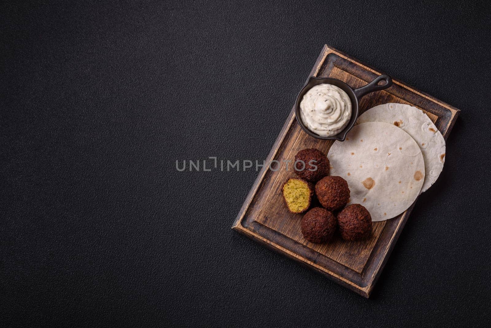Fried chickpea falafel balls with salt, spices and herbs. Vegetarian and vegan dish