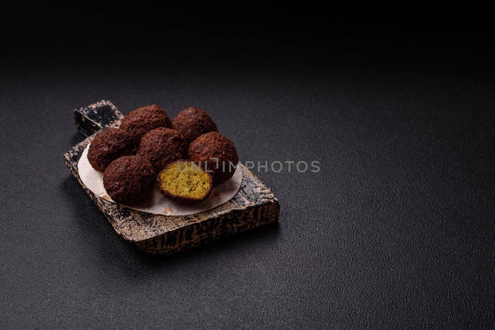 Fried chickpea falafel balls with salt, spices and herbs. Vegetarian and vegan dish