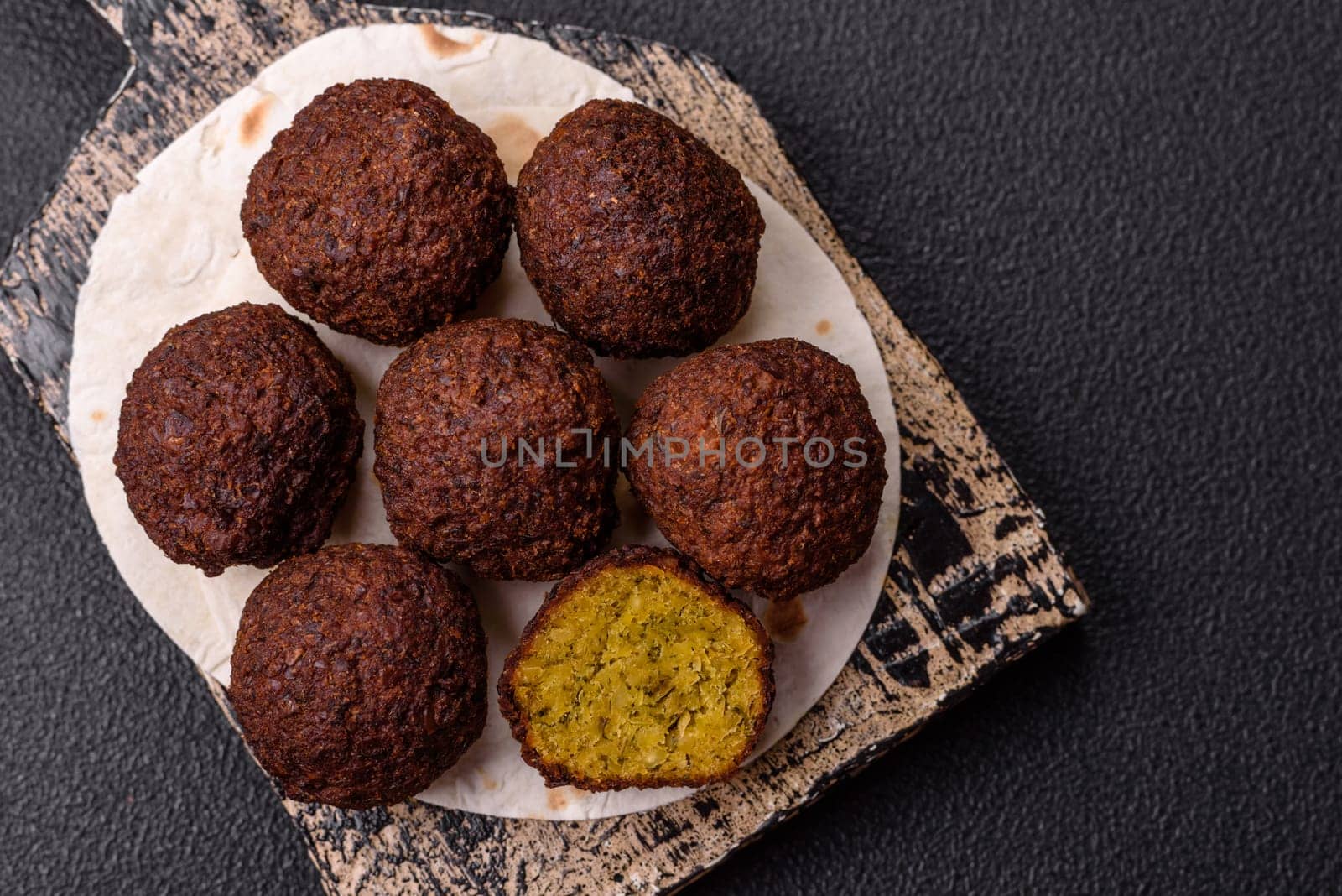 Fried chickpea falafel balls with salt, spices and herbs. Vegetarian and vegan dish