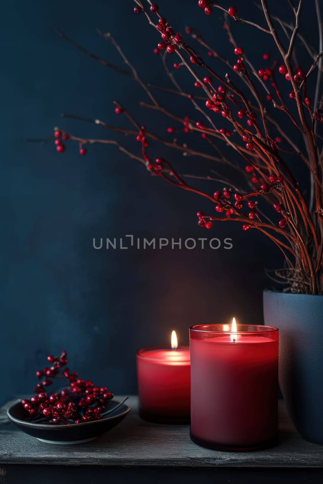 Red candles on a festive red background . Advent, Christmas, holiday and traditions.