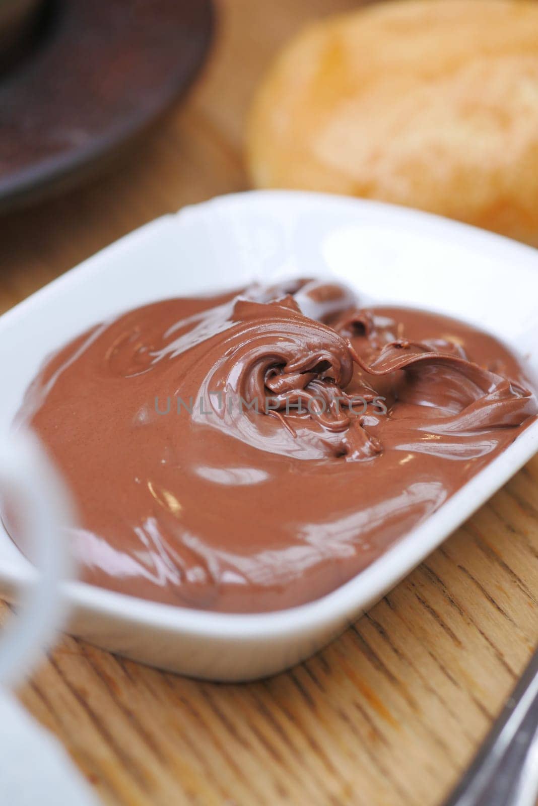 A creamy chocolate spread perfect for enhancing desserts and snacks, making every bite delightful