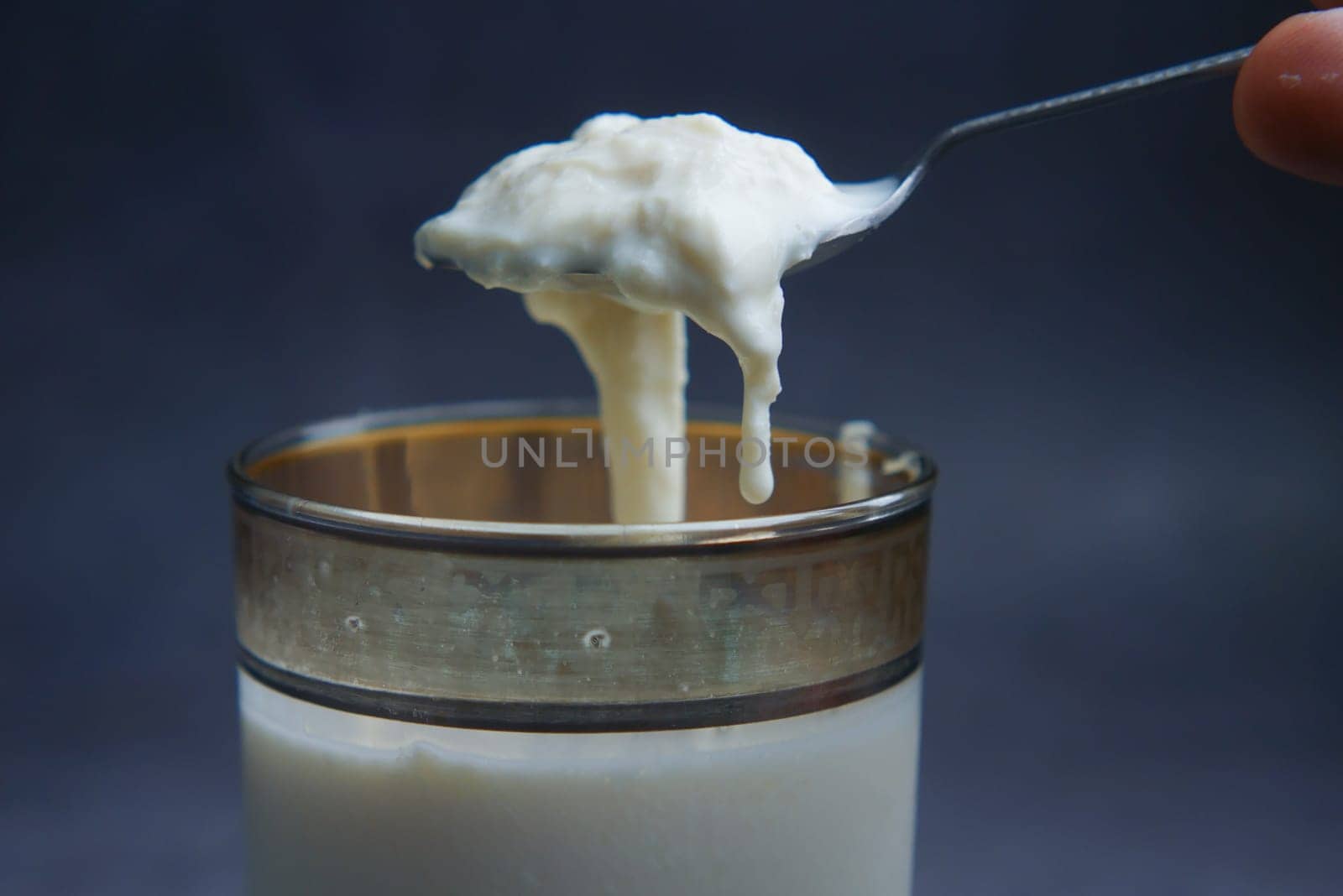 glass of whole cream milk on table ,