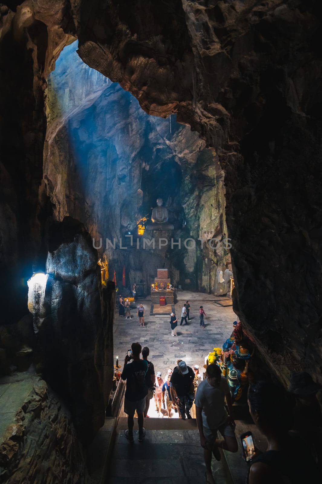 Buddhist temple with statues and a sanctuary inside the Huyen Khong Cave in the Marble Mountains in Da Nang. DA NANG, Vietnam - September 12, 2024.