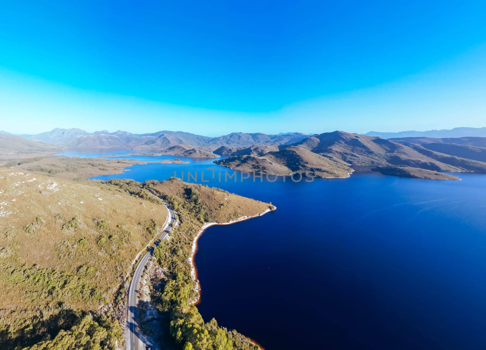 Aerial landscape of Lake Pedder on a hot summer's afternoon in Southwest National Park, Tasmania, Australia